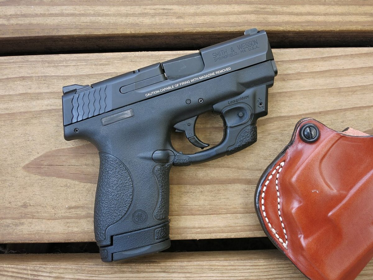 Smith & Wesson M&P Shield 9mm with leather holster photo 1