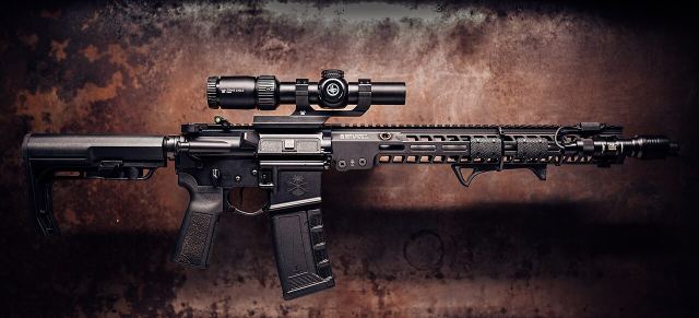 AR-15 rifle, 5.56 NATO, 16" barrel with 1-8x scope